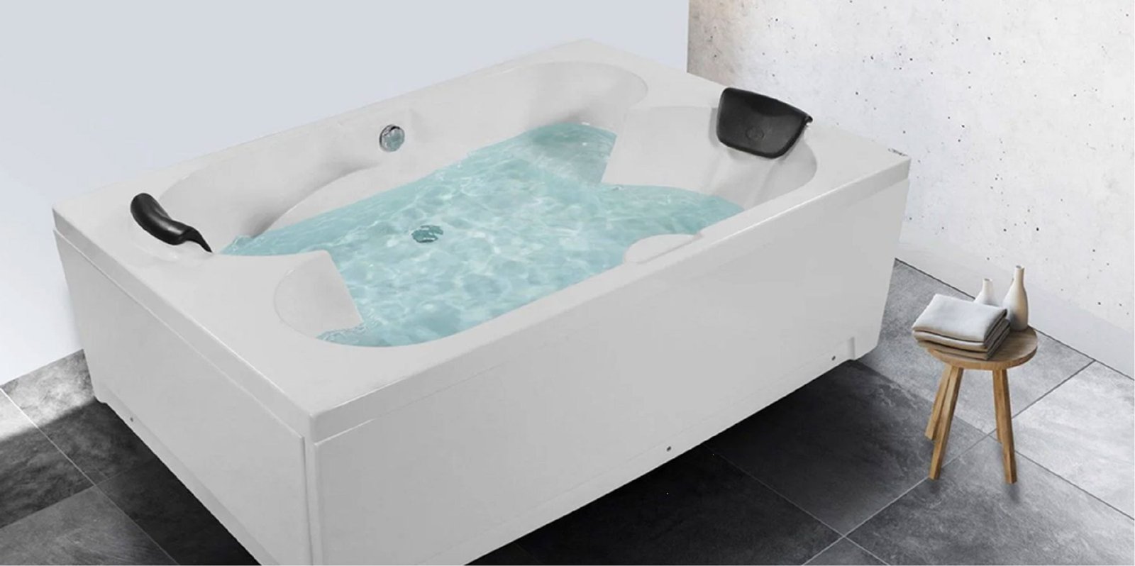 Freestanding tub with water and headrests