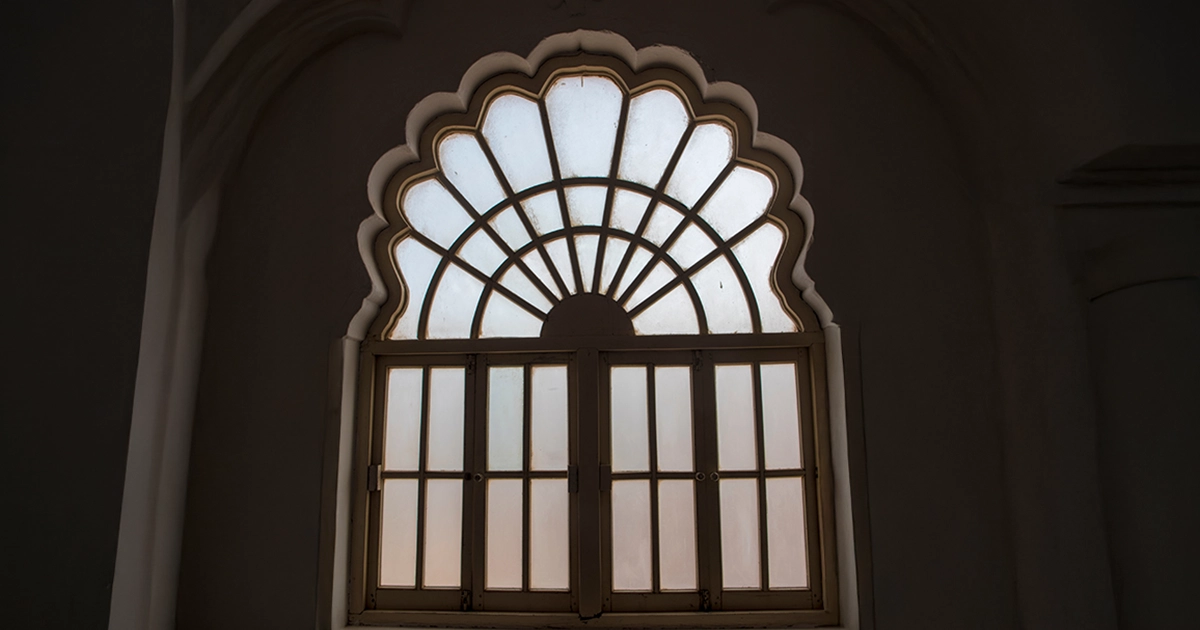 Traditional uPVC arch window design.