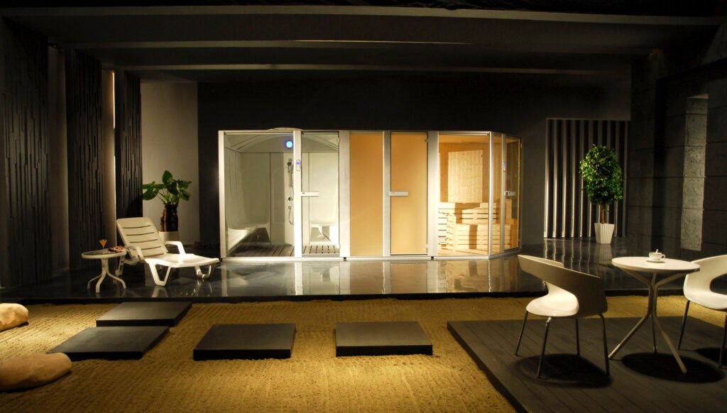 Spacious luxury steam and sauna setup featuring a premium wellness zone with wooden sauna room and modern steam cabin, perfect for spa-inspired home interiors and relaxation spaces.
