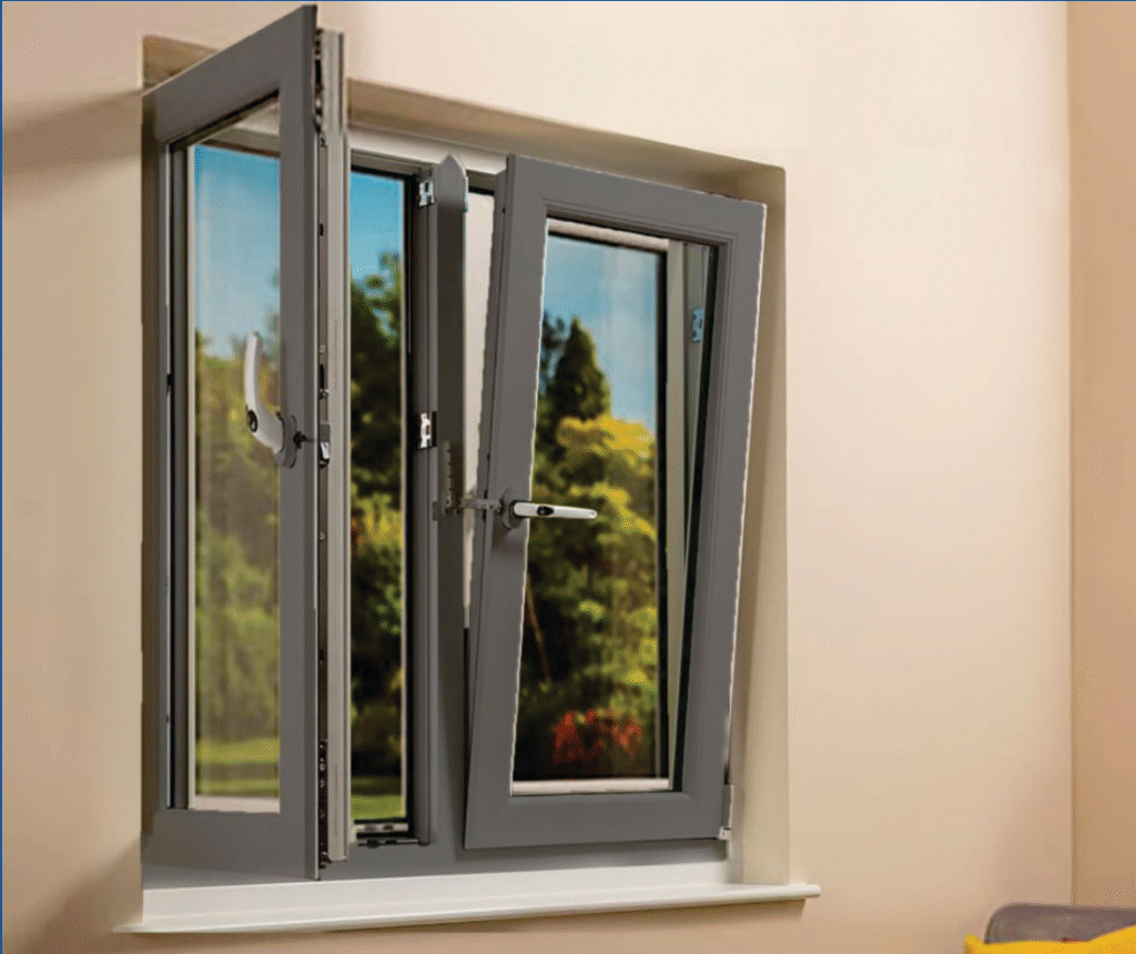 Tilt-and-turn window system showing locking mechanism and stylish uPVC door handles in a luxury home interior.
