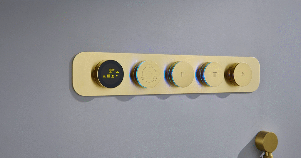 High-end digital thermostatic shower diverter with temperature display and multi-function control knobs in a luxury bathroom.