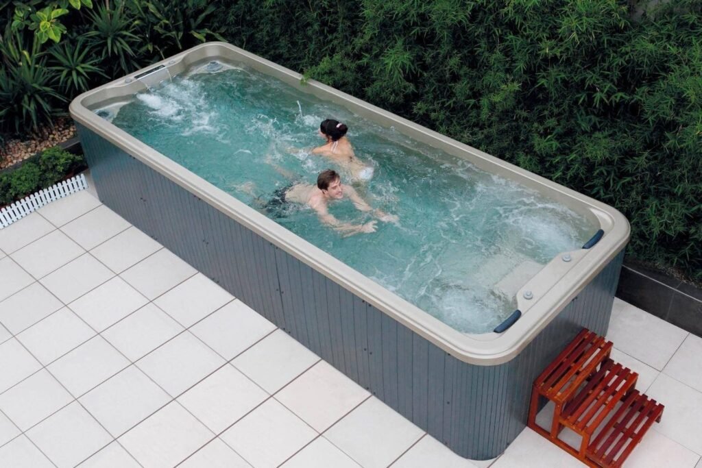 Compact home swimming pool with hydrotherapy jets used by family members, ideal for fitness, relaxation, and everyday wellness