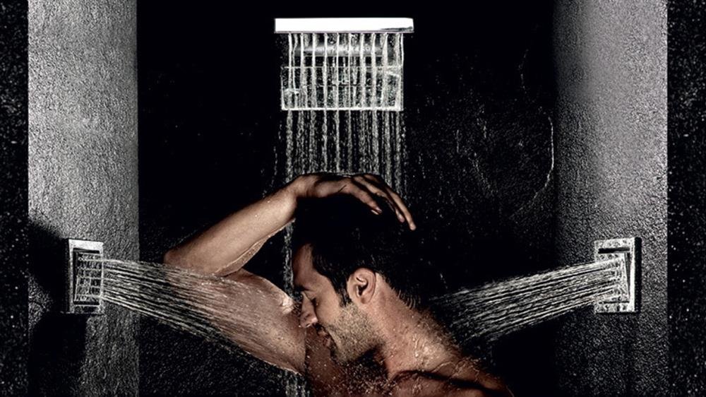 Body jet shower with multiple wall mounted jets creating a spa like hydrotherapy experience at home