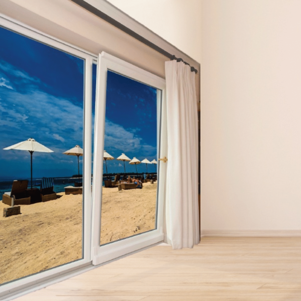 Minimalist interior design with large uPVC windows allowing natural light into modern living space