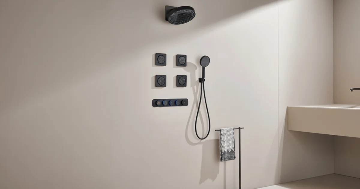 Luxury bathroom setup featuring concealed bathroom diverter with overhead shower, hand shower, and body jets